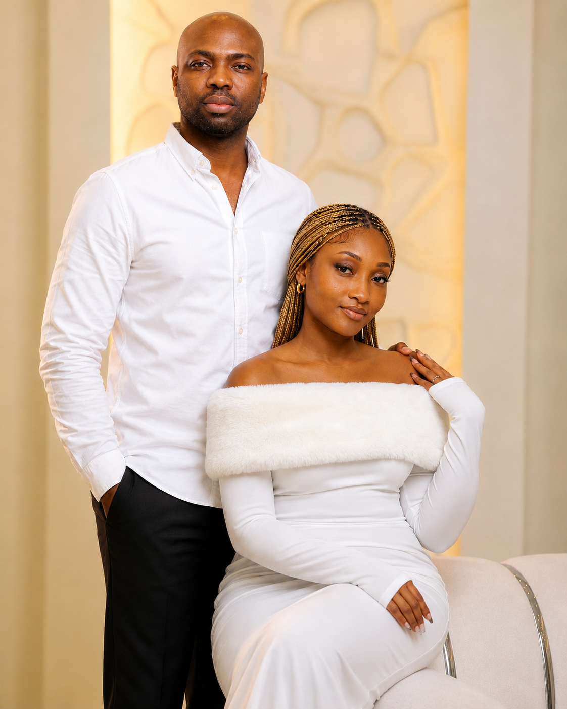 Oluwatobi and Olayinka in ivory, photographed in a softly lit room